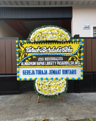 Papan Bunga Duka di Samparwadi